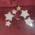 Set di specchi a forma di stelle di varia dimensione-0